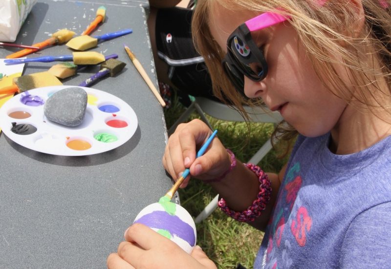 Girl Painting Rocks at Viera Wetland Festival Ritch Grissom