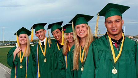 A group of Viera High School graduates in cap and gown