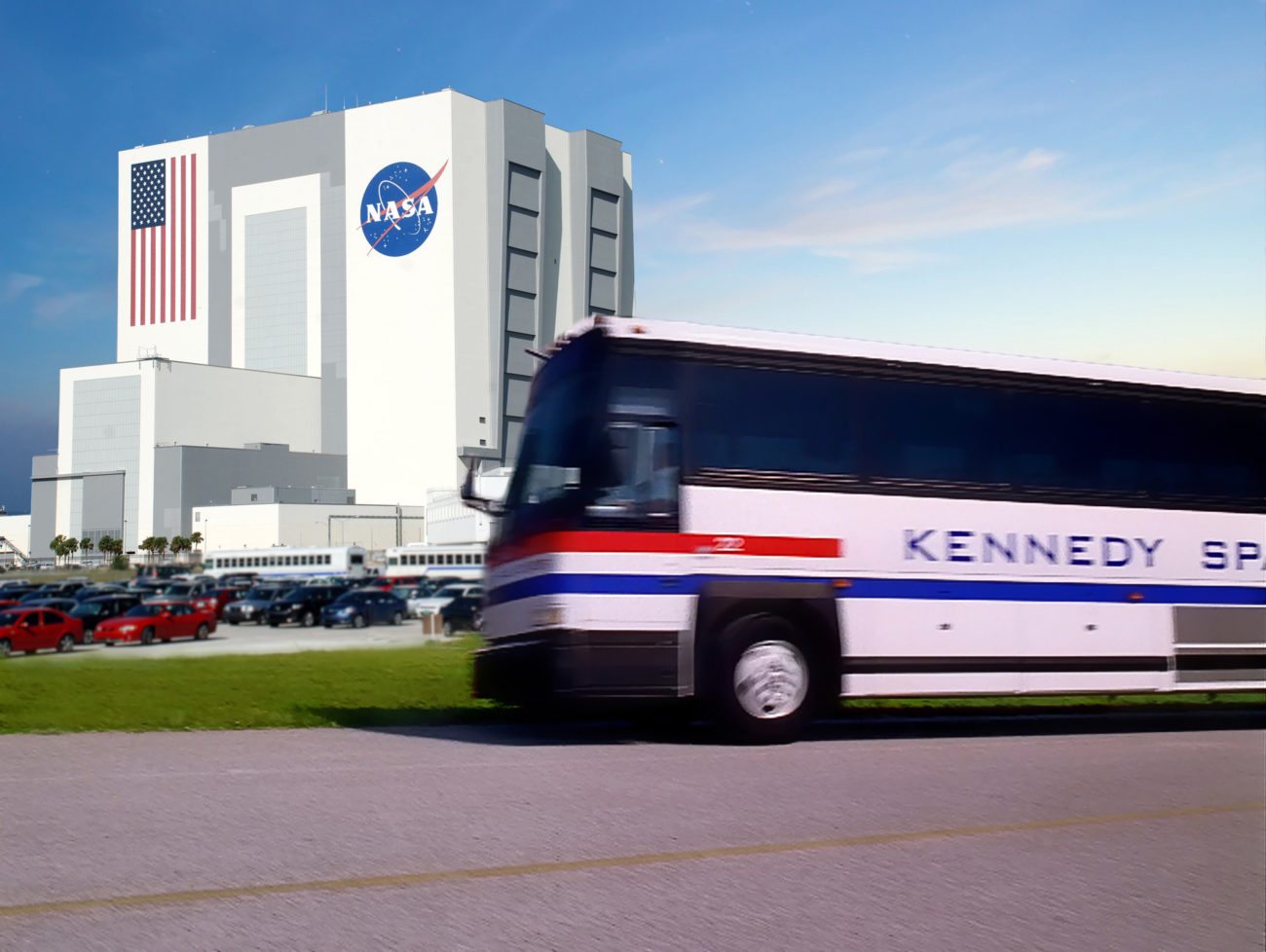 A Shuttle Bus zips by the Vehicle Assembly Building (VAB) - Kennedy Space Center Visitor Complex